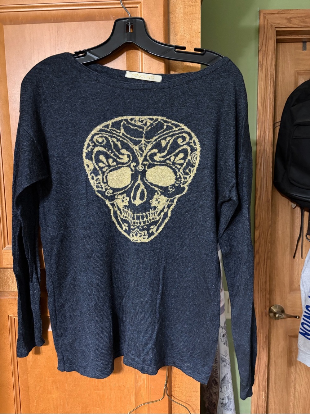 Lightweight Black Crewneck Sweater with Decorative Gold Skull -
